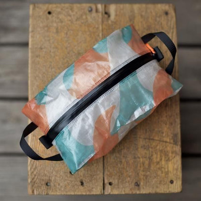 perm and baton  Center Zip SACK M